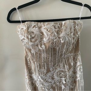 Lulu’s embroidered train wedding gown